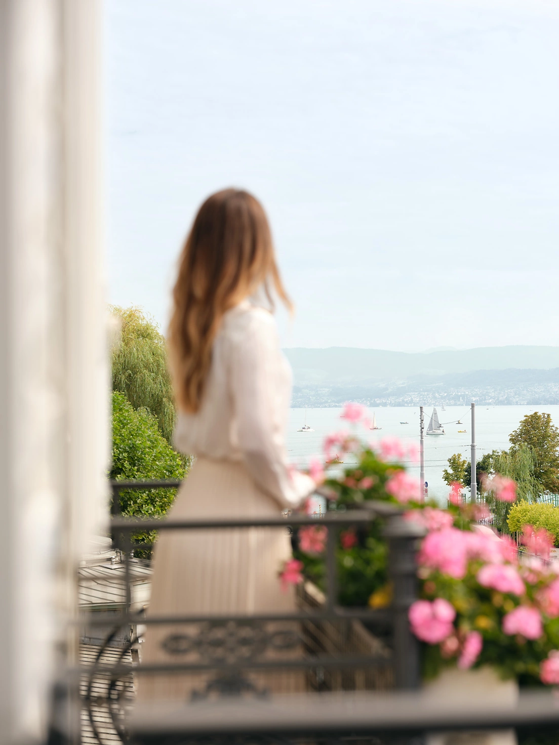 2024 BAL River Suite Balcony with Lake View Woman